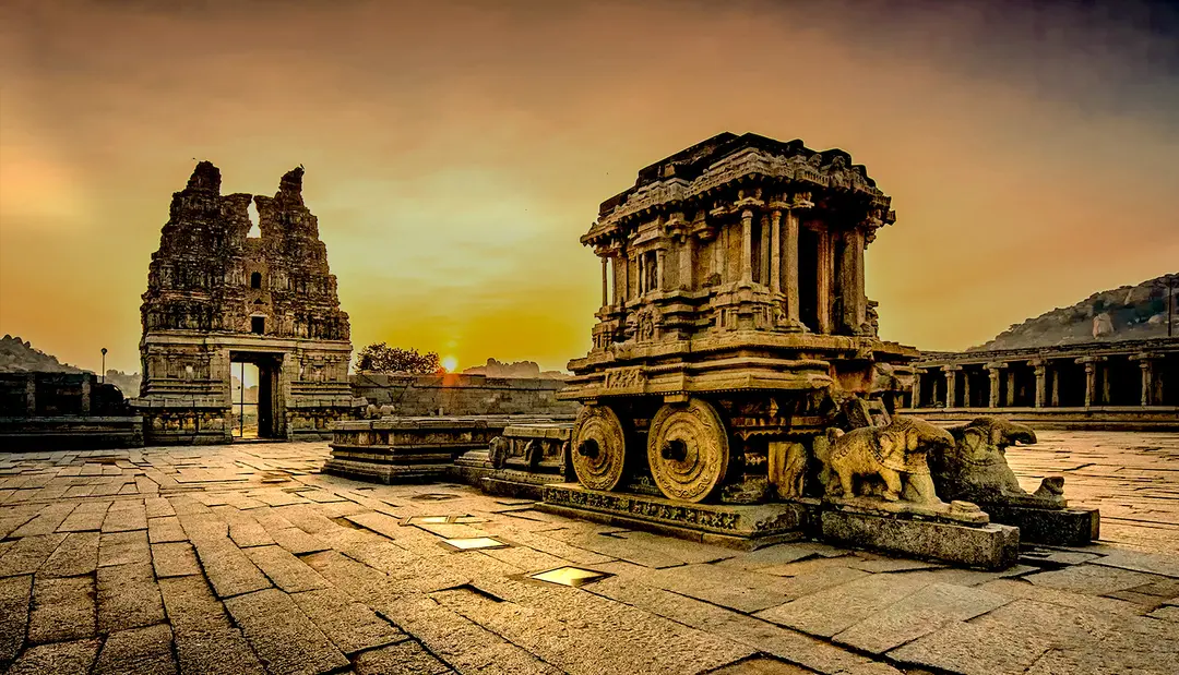 Ancient stone temple architecture in Hampi – heritage backdrop for corporate retreats and leadership offsites