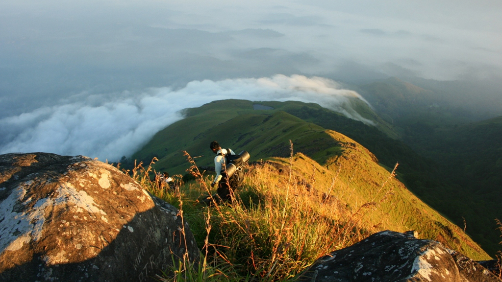 Misty hill viewpoint near Munnar — scenic backdrop for corporate leadership retreats in Kerala